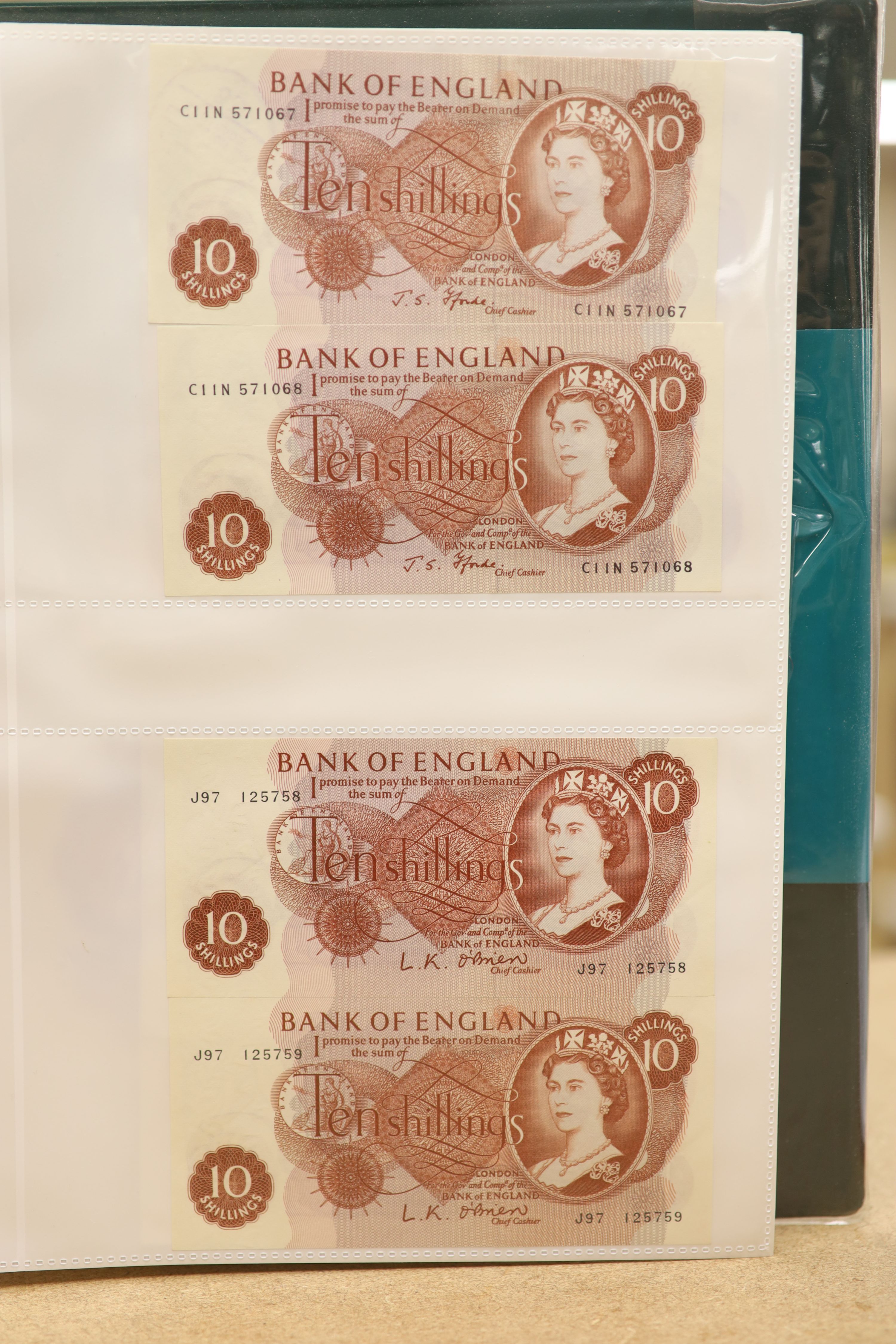 A collection of Bank of England and Scottish banknotes to include: 21 QEII 10 shillings, 14 O'Brien and Beale 10 shillings, 1 Peppiatt 10 shillings, 4 Hallam one pound notes, 18 O'Brien or Beale one pound notes, 8 Peppia